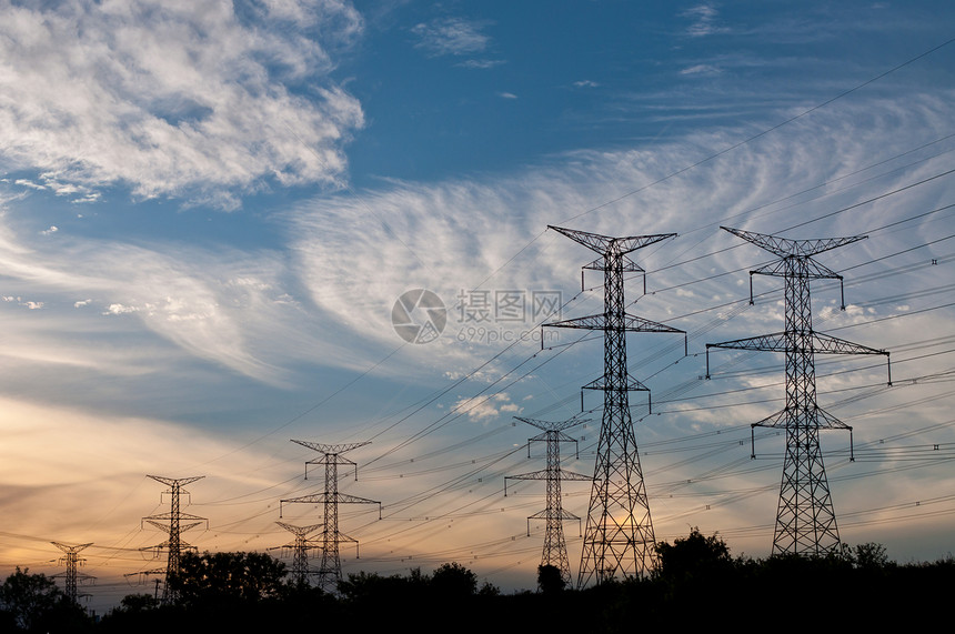 位于杜斯克的输电塔电极电气力量天空棕色电线日落水平活力照片图片