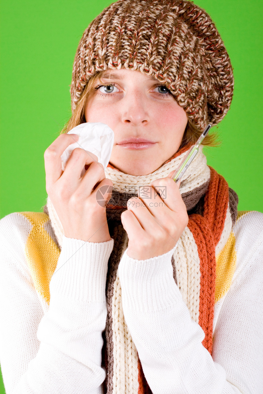 使用手帕和温度计的妇女女士围巾流感鼻子兜帽绿色棕色发烧针织感染图片