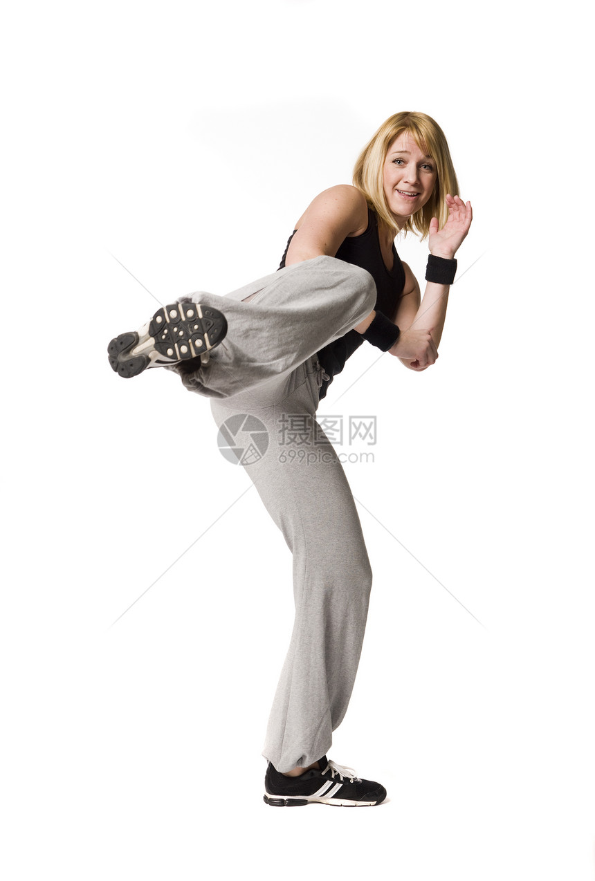 女孩踢脚工作健身房女士微笑竞技体操拳击跆拳道工作室女性图片