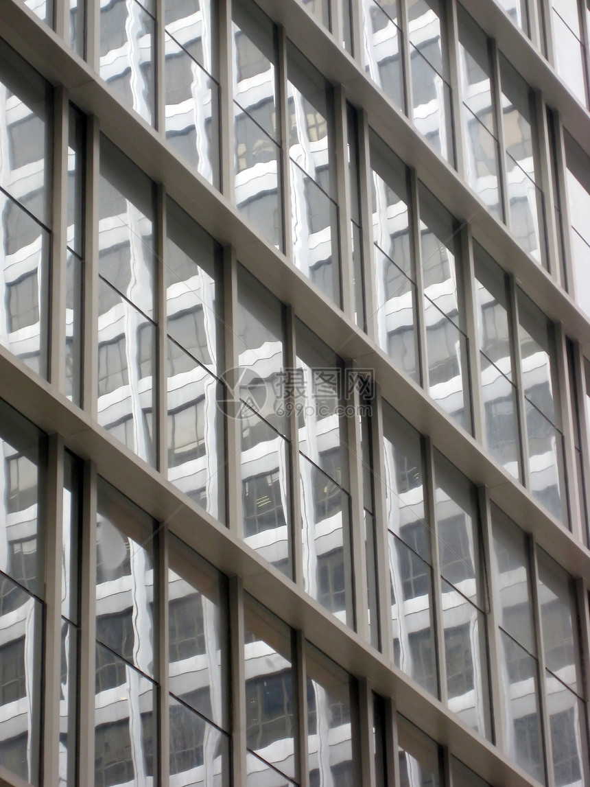 香港的摩天大楼窗口背景市中心玻璃环境中心镜子房子城市技术工业场景图片