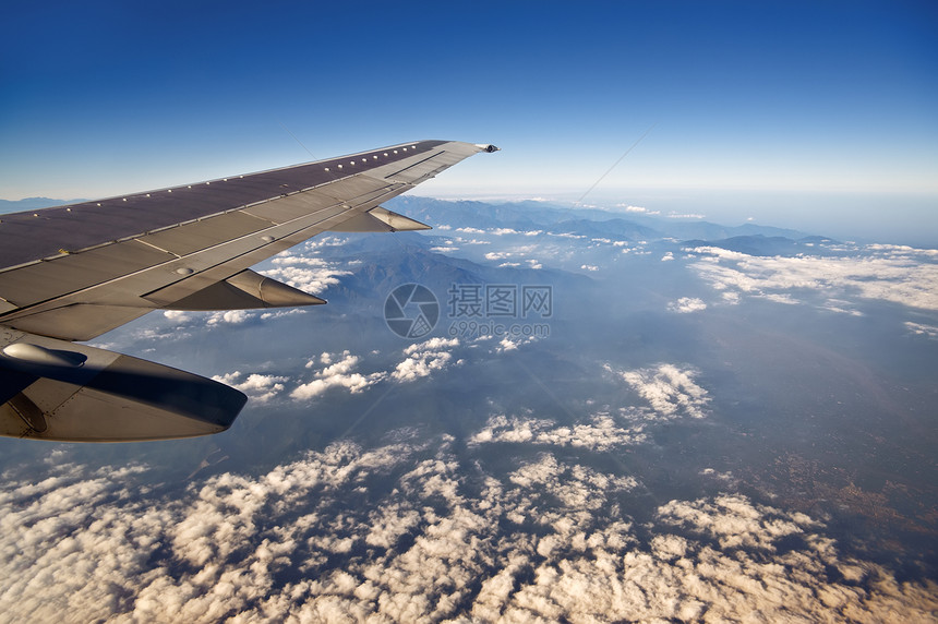 飞机窗户游客运输旅游呼吸道航班座舱风景速度蓝色图片