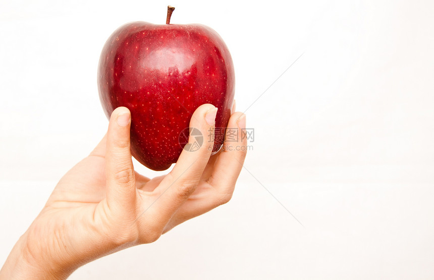 手工摘红苹果水果生活蔬菜女孩减肥图片
