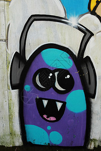 涂鸦紫色蓝色艺术绘画音乐微笑喜悦街道耳机背景图片