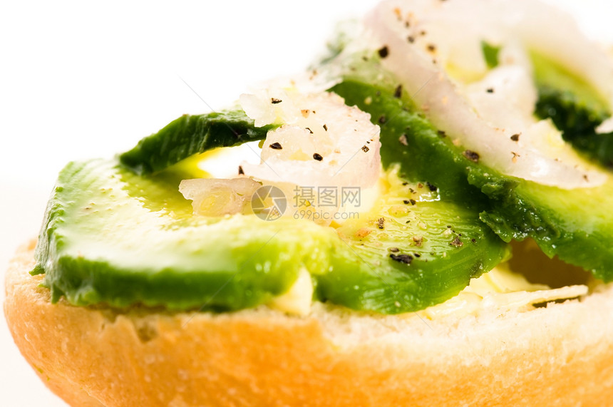 木板上含鳄梨的三明治叶子胡椒健康碎片午餐绿色面包草本植物蔬菜包子图片