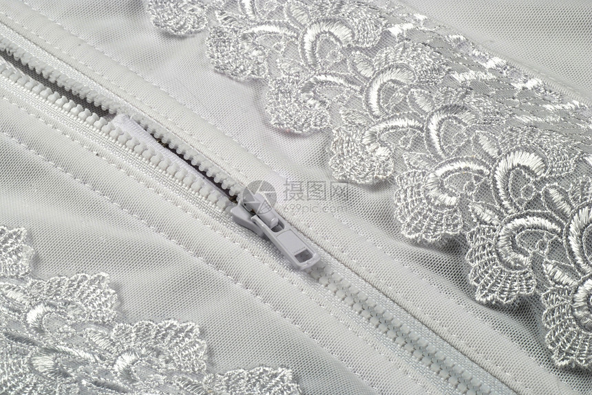 白色拉链织物蕾丝腰带内衣胸衣服装女裁缝衣服缝纫宏观图片