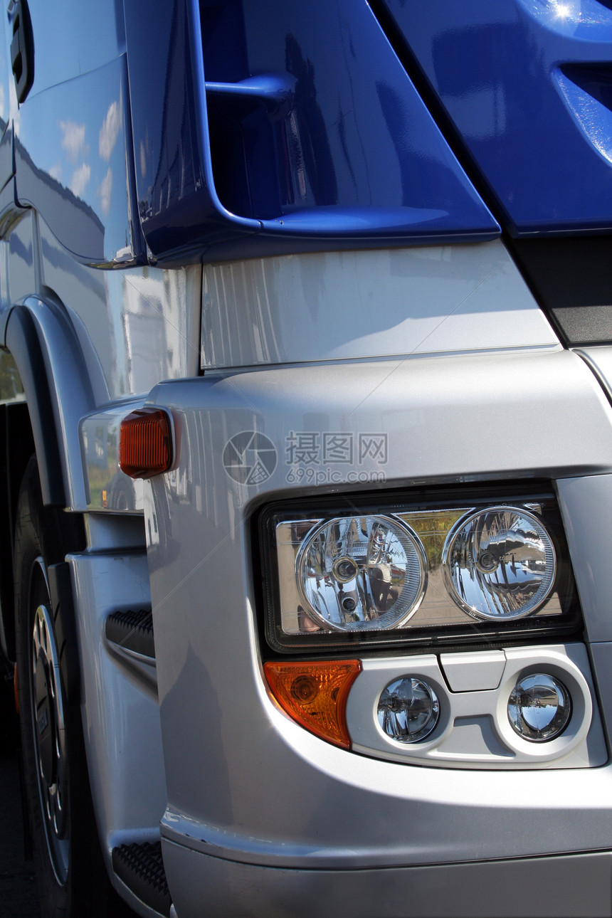 蓝色卡车后勤机器力量塑料速度金属运输头灯玻璃车辆图片