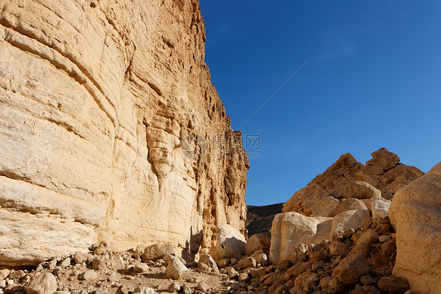 沙漠中的砂石岩黄色环境公园石头峡谷风化橙子天空风景内盖夫图片