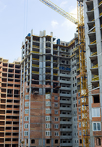 正在建造工地房子城市建筑建房起重机背景图片