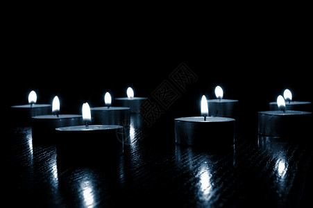 蜡烛宗教黄色宏观黑色烛光温泉火焰背景图片