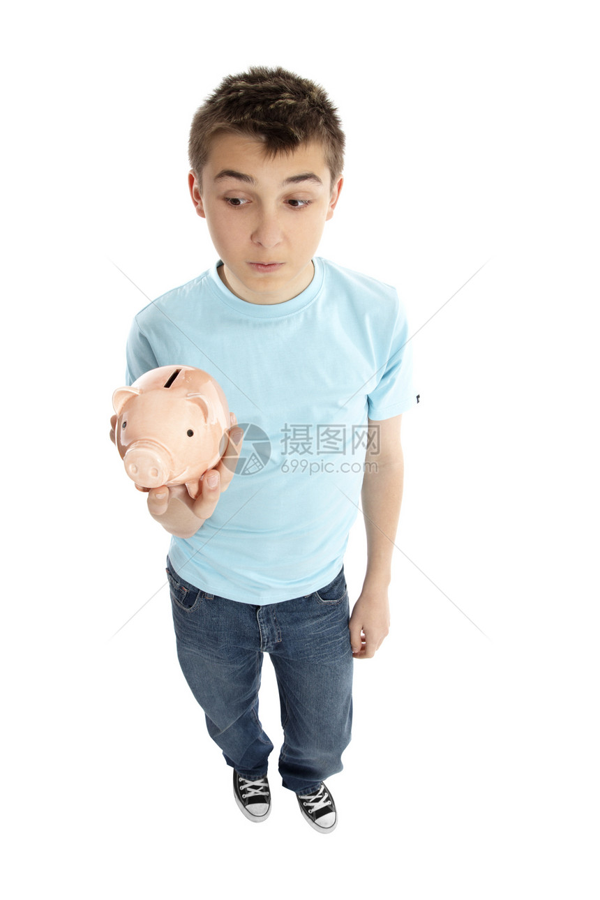 男孩拿着小猪银行钱箱钱盒惊喜投资存钱罐生长全身首都孩子财富资金图片