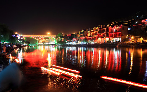 中国凤凰城夜幕风景村庄餐厅派对橙子酒吧少数民族房子游客娱乐建筑背景图片