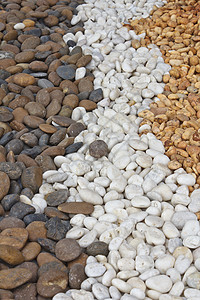 石头背景白色花园岩石曲线物体纹理棕色卵石背景图片