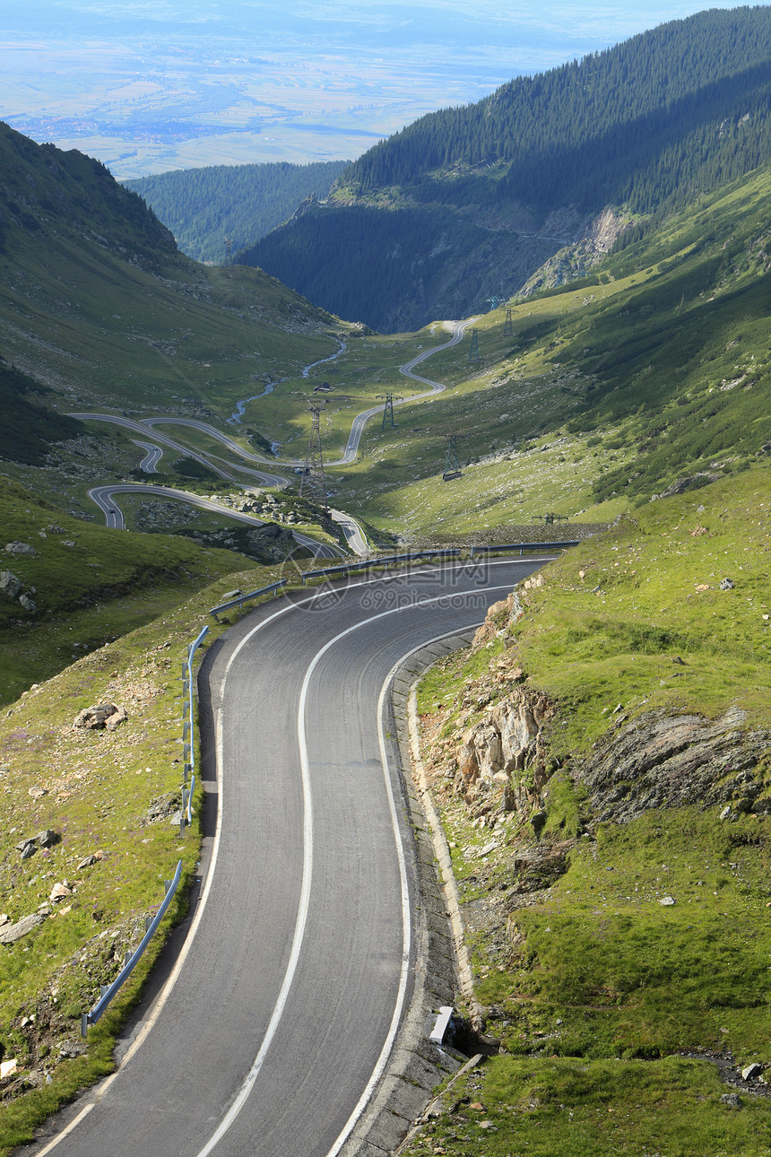 高海拔公路假期汽车曲线驾驶交通运输岩石车道旅游沥青图片