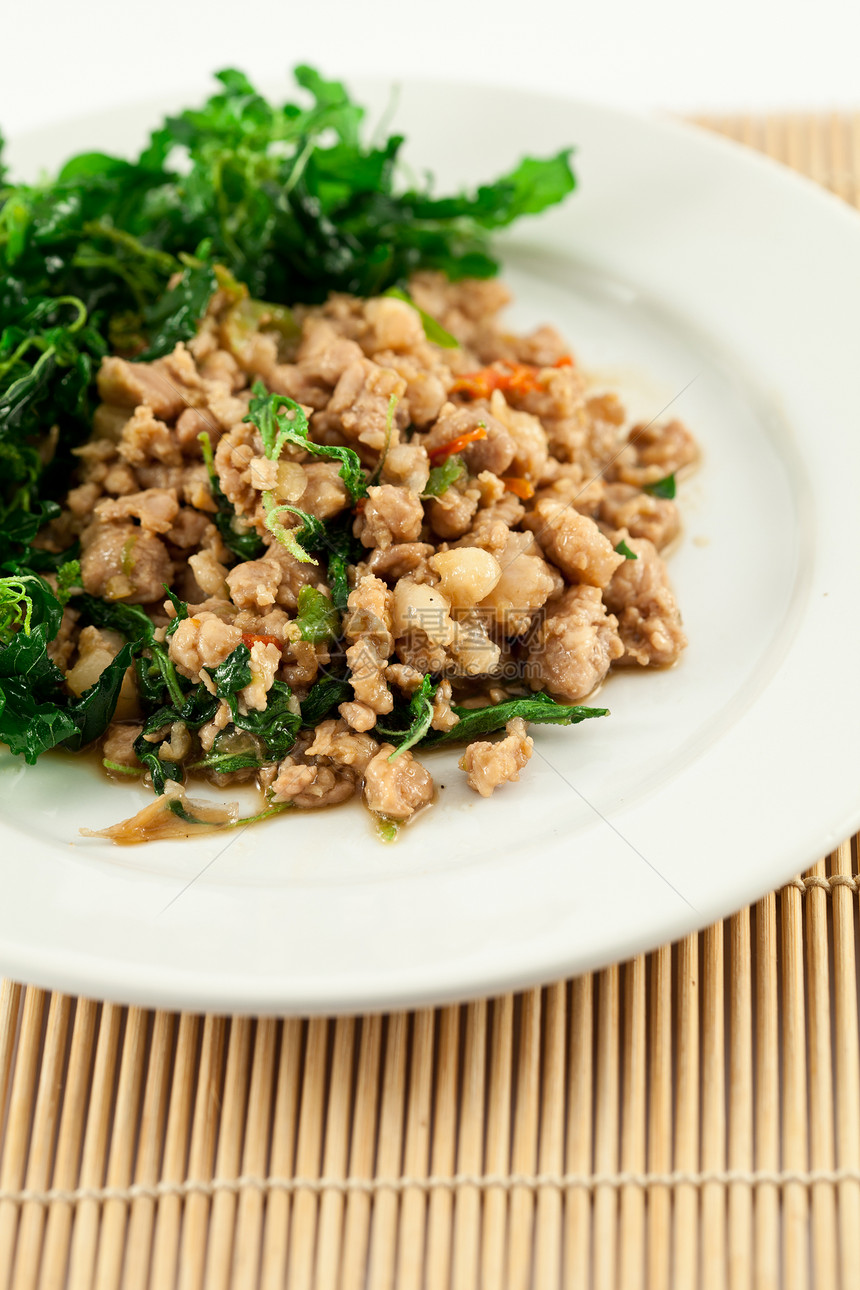 炒猪肉鱼香料餐厅胡椒蔬菜食物美食盘子辣椒午餐搅拌图片