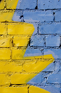 彩色墙壁水泥建筑学艺术材料黄色蓝色建筑崎岖房子砖墙背景图片