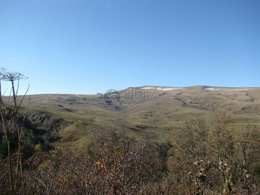 腊果纳基高原高山一条路线斜坡风景剪影山丘背景山脉全景天空图片