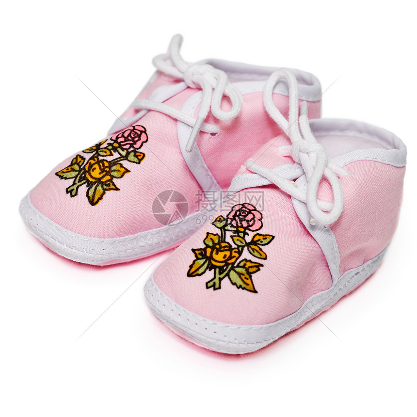 带有鲜花的婴儿粉红色靴子图片