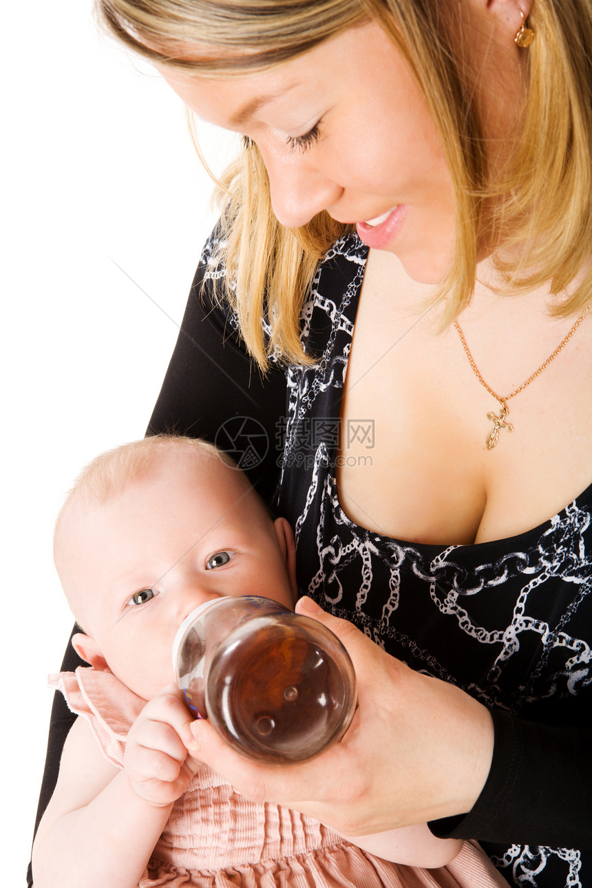 母乳喂养婴儿围兜喜悦家庭反射瓶子后代快乐孩子女孩享受图片