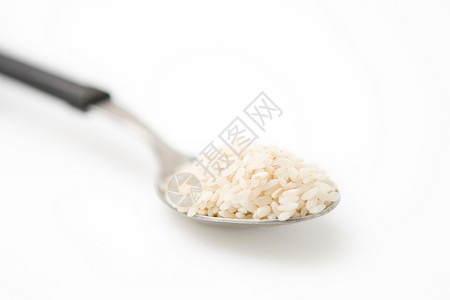 大米稻米勺子营养白色烹饪矿物质厨房生活背景图片