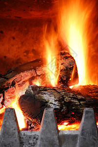 舒适的家居壁炉橙子温暖装饰火焰房子烟囱日志风格木头建筑学背景图片