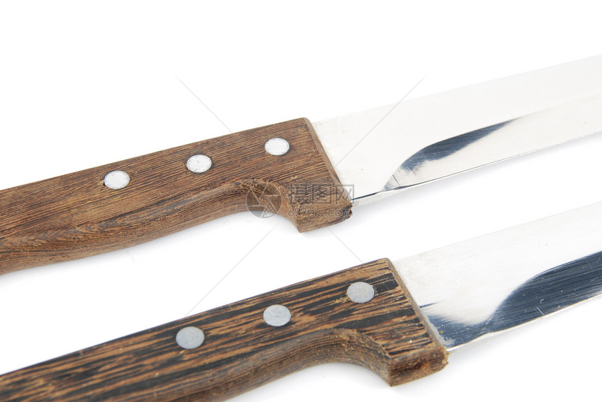 特写白色的木制厨房刀美食刀具屠夫木头工具食物危险金属厨师刀刃图片