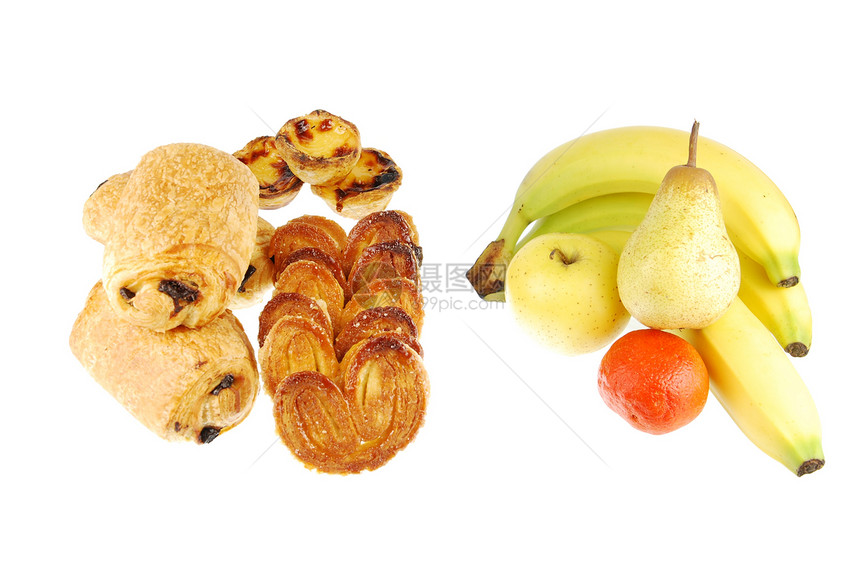 健康与不健康(白上烤菜和水果)图片