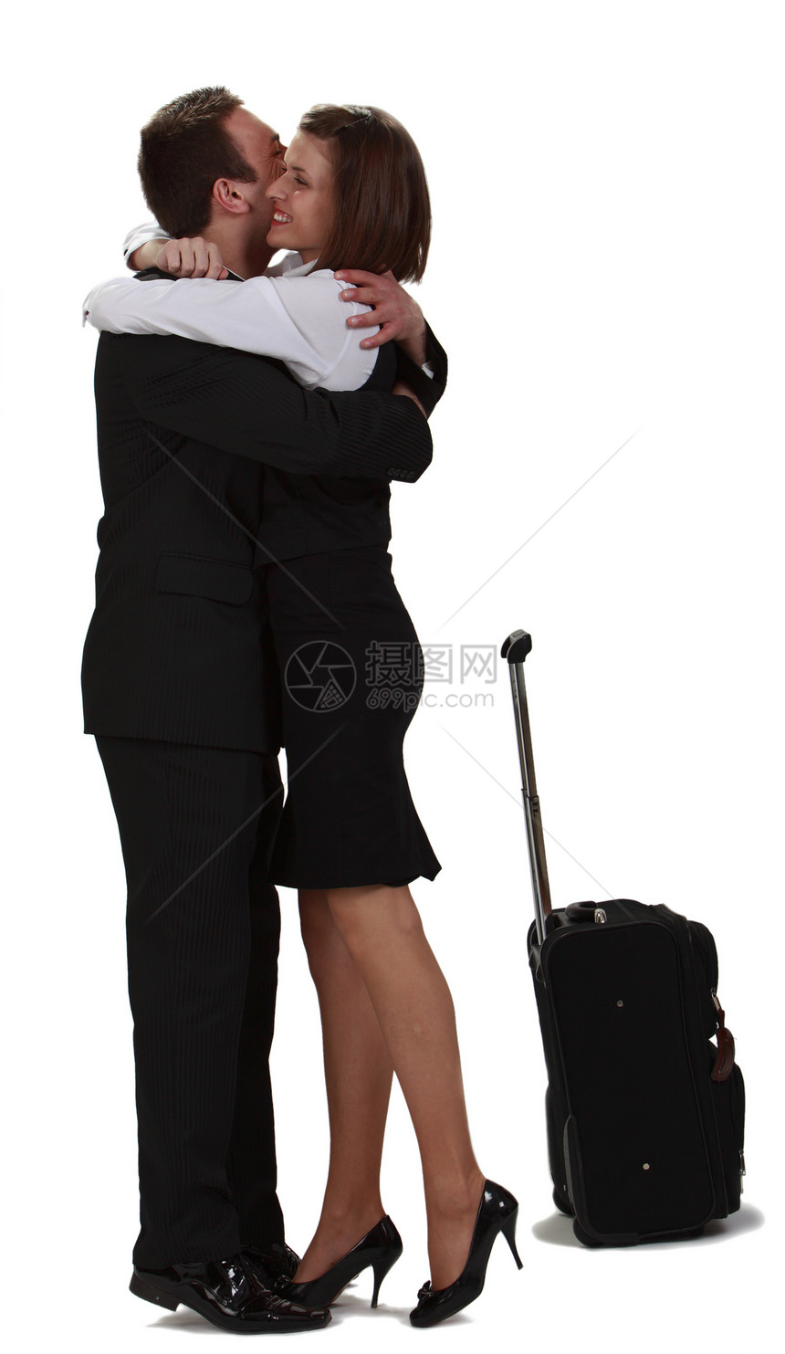 爱人的拥抱情怀手提箱成人脚跟幸福女士男性感情人士商务图片
