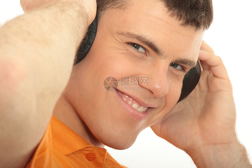 有耳机的人喜悦青少年音乐播放器玩家音乐活力白色男生青年收音机图片