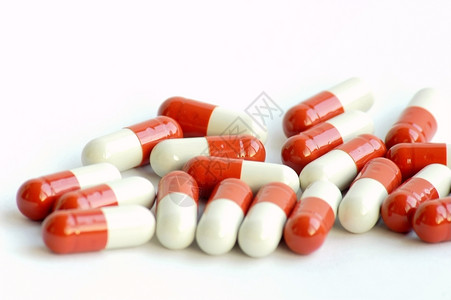 药品治疗保健红色药店胶囊药剂学药片白色宏观卫生背景图片