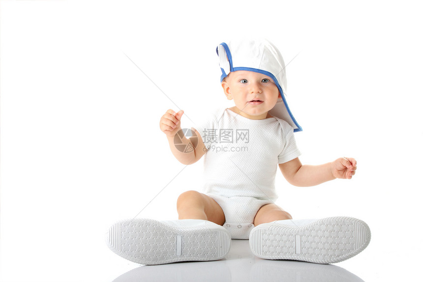 婴儿用鞋和基盘帽尝试婴儿快乐喜悦男生眼睛帽子情感育儿乐趣运动幸福图片