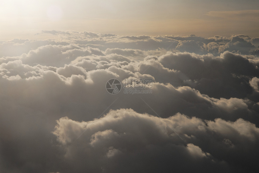 云层之上蓝色天空航空公司白色日落风景日出飞行地平线航班图片