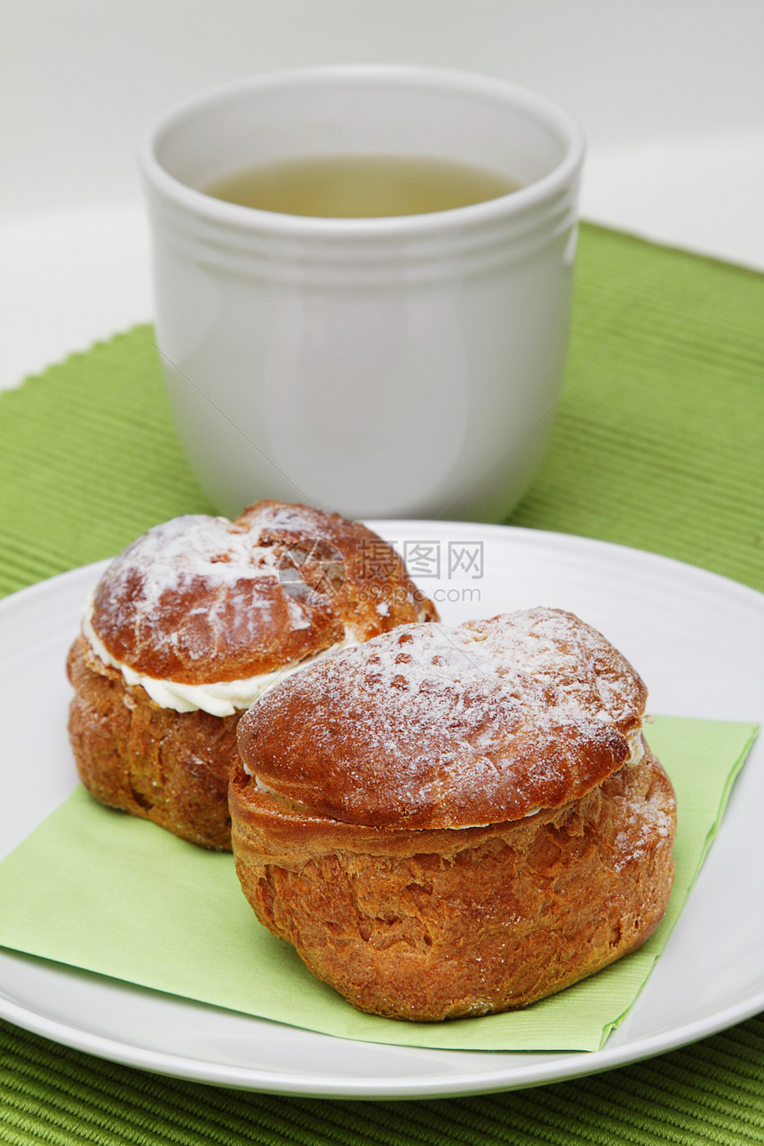 利润和茶叶蛋糕糕点圆形美食绿色面包杯子小吃奶油状棕色图片