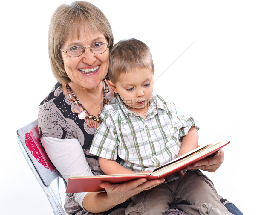 外祖母和孙子在看书家庭生活学习幸福儿子祖父母童年故事男性男生图片