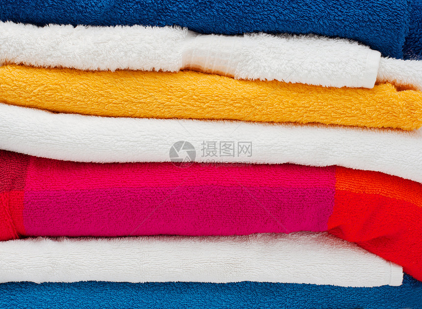 毛巾温泉面巾折叠纺织品吸收吸水性织物黄色棉布蓝色图片