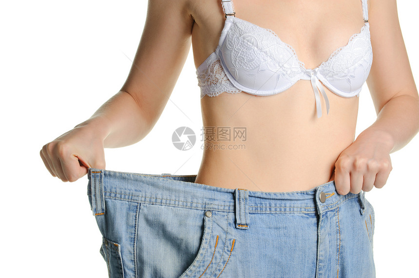 大小较大的妇女和牛仔裤妇女身体腰部裤子成功工作室重量女性成就摄影蓝色图片