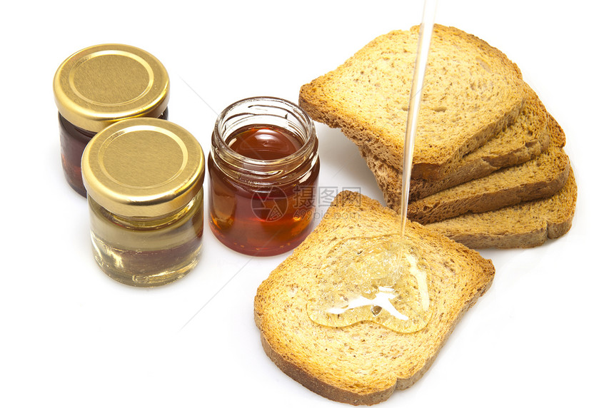 白色背景上的蜂蜜饮食甜点粮食早餐食物图片