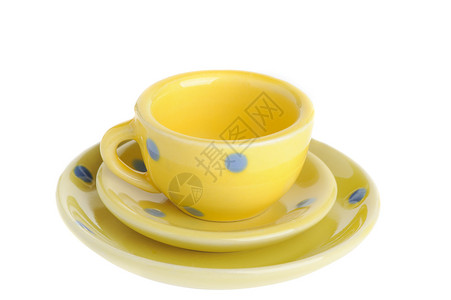 黄黄杯白色创造力活力黄色陶器咖啡厨房陶瓷饮料早餐背景图片