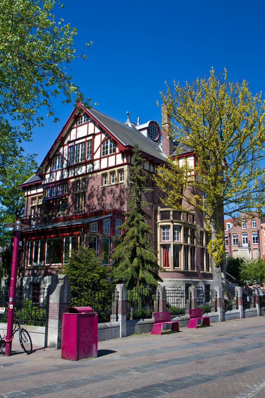 阿姆斯特丹的一条运河商务旅游市中心首都教会城市建筑房子旅行圆顶图片