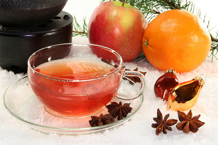 奈雪的茶冬茶八角肉桂茶杯茶壶橙子酿造香料背景