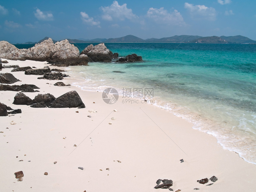 卡姆海滩冲浪场景远景风景海岸线海景支撑涟漪石头蓝色图片