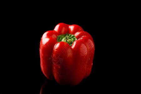 黑背上胡椒反射青椒黄色红色黑色蔬菜辣椒有机食品绿色食物背景图片
