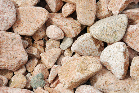 孔洞石头卵石地面背景图片