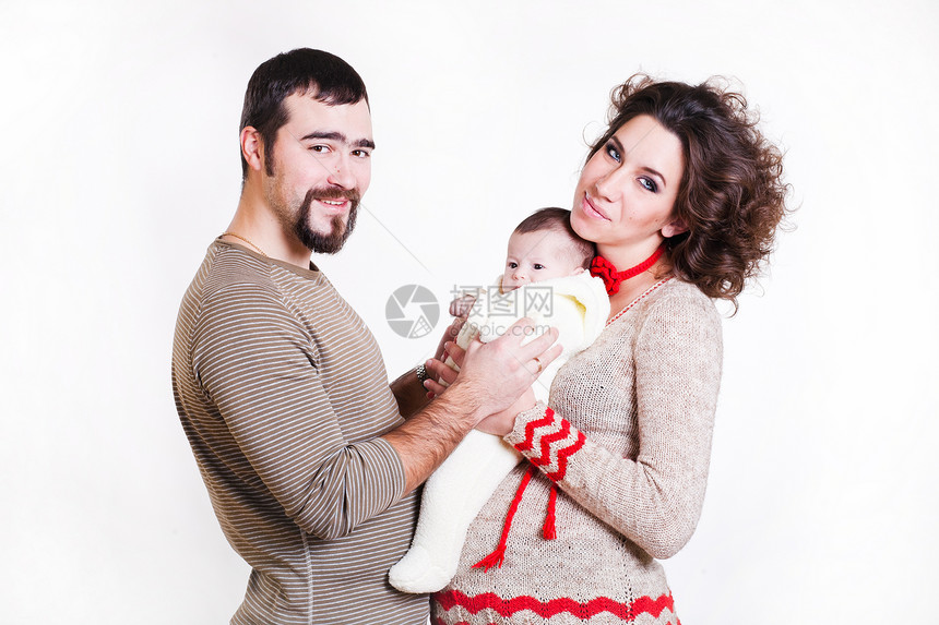 穿着带婴儿毛衣的美丽的孕妇后代女孩们拥抱儿童新生场景家庭快乐兄弟女性图片
