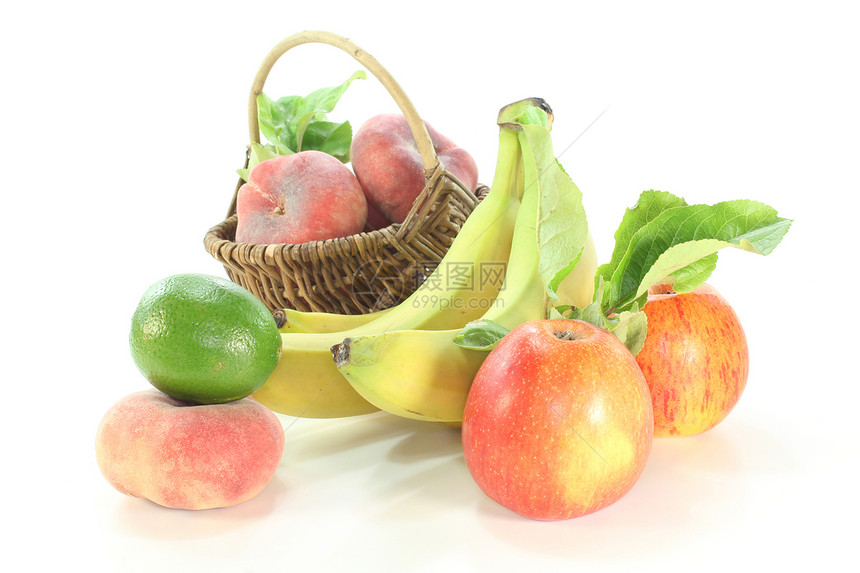 果果混合黄色维生素水果热带异国食物白色篮子绿色情调图片