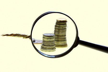 硬币经济面团镜片白色金子放大镜玻璃财政背景图片