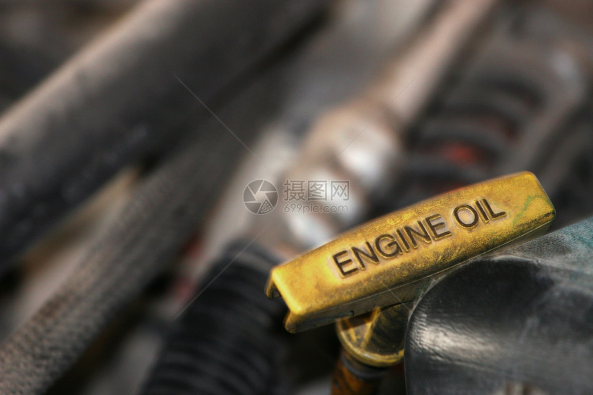 检查石油油尺汽车流体机械修理技师兜帽引擎力学卡车图片