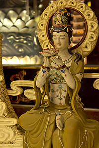 关仪宗教女性女神信仰佛教徒文化上帝艺术雕像菩萨背景图片
