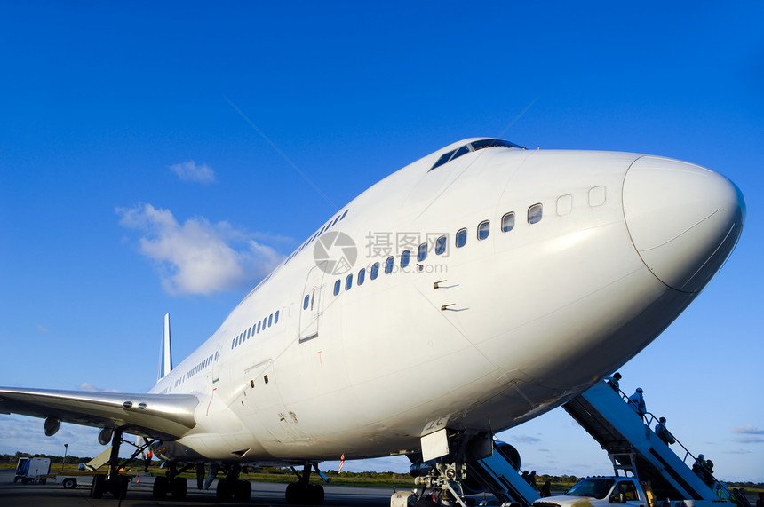 机场飞机蓝色客机货物引擎土地乘客旅游旅行交通运输图片