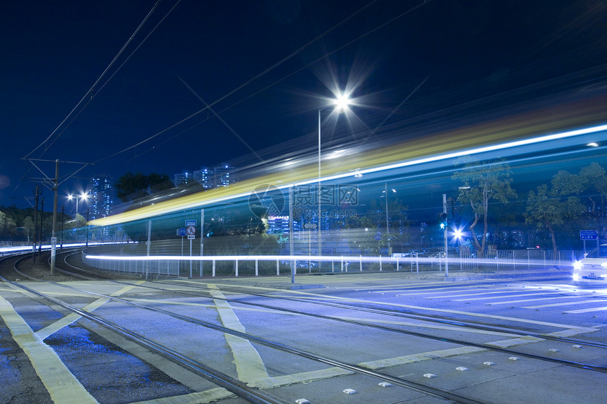 香港夜间的轻型铁路速度建筑戏剧性蓝色市中心城市运输线条街道驾驶图片