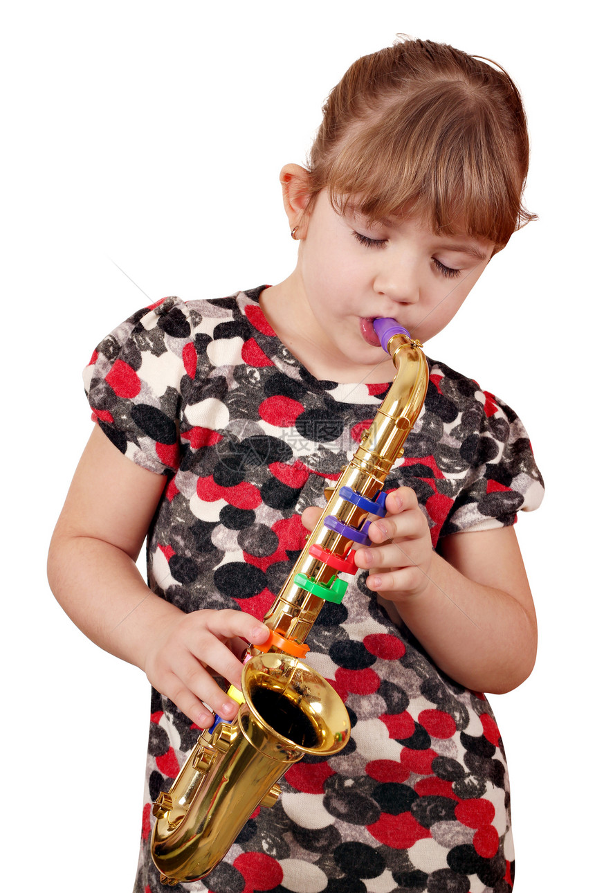 小女孩在萨克斯音上演奏音乐萨克斯管玩家女性白色孩子女儿乐器音乐家玩具乐趣图片
